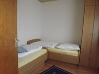 Zimmer mit zwei Einzelbetten